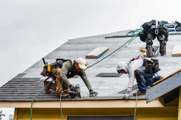 Professional Gutter Installation technician working in Newport, OR